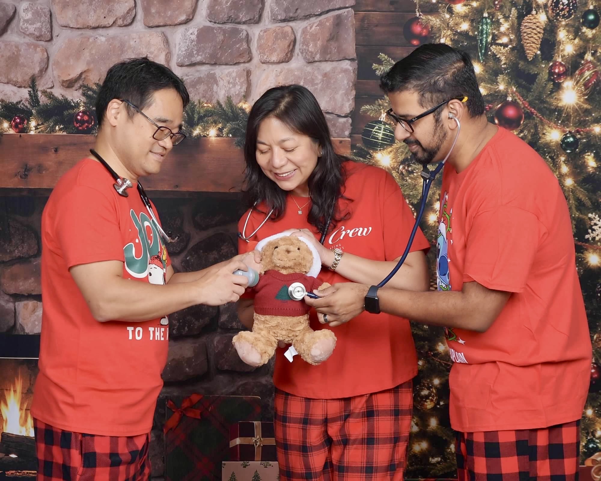 Doctors checking in on their favorite holiday patient